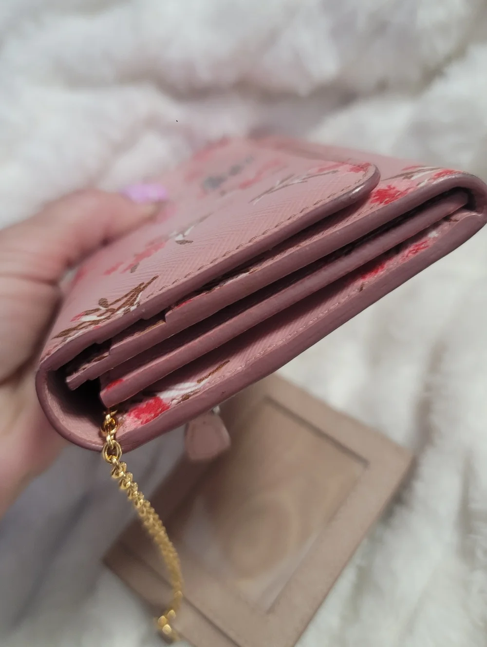 Prada Floral Continental Wallet made from pink Saffiano leather